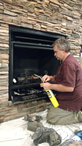 gas fireplace service and repair in action